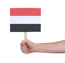 Image showing Hand holding small card - Flag of Yemen