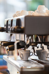 Image showing Professional coffee machine making espresso.