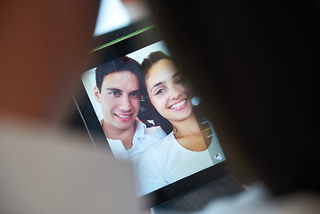 Image showing couple at modern home using tablet computer