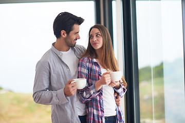 Image showing relaxet young couple drink first morning coffee