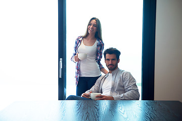 Image showing relaxet young couple drink first morning coffee