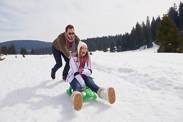 Image showing happy young couple having fun on fresh show on winter vacation