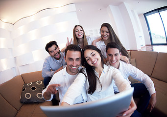 Image showing group of friends taking selfie