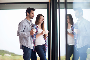 Image showing relaxet young couple drink first morning coffee