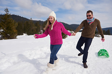 Image showing happy young couple having fun on fresh show on winter vacation