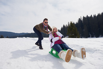 Image showing happy young couple having fun on fresh show on winter vacation