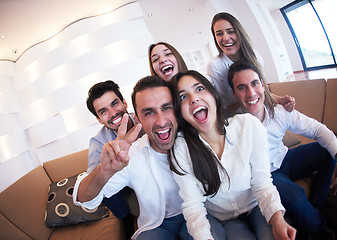 Image showing group of friends taking selfie