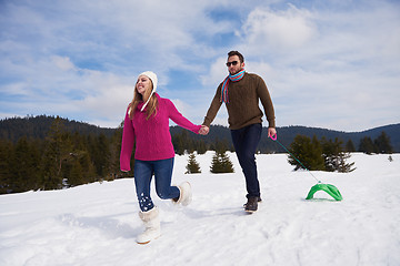 Image showing happy young couple having fun on fresh show on winter vacation