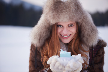 Image showing winter girl with gift