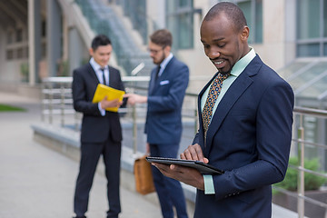 Image showing The business black man with laptop