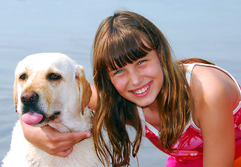 Image showing Girl dog portrait