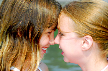 Image showing Two girls faces