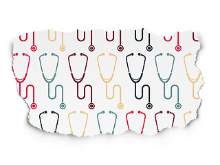 Image showing Health concept: Stethoscope icons on Torn Paper background