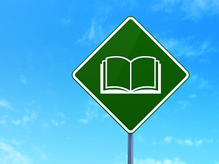 Image showing Science concept: Book on road sign background