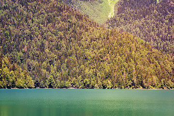 Image showing A picturesque lake surrounded by high mountains.