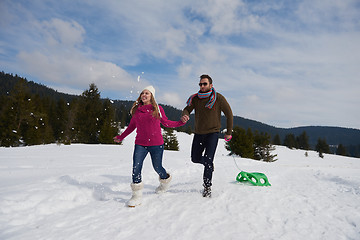 Image showing happy young couple having fun on fresh show on winter vacation