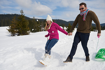 Image showing happy young couple having fun on fresh show on winter vacation