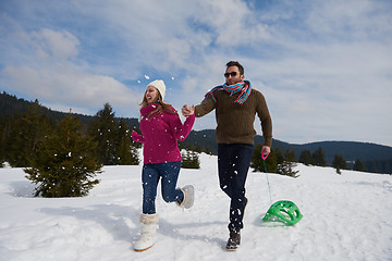 Image showing happy young couple having fun on fresh show on winter vacation