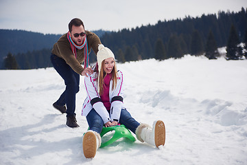 Image showing happy young couple having fun on fresh show on winter vacation