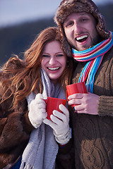 Image showing couple drink warm tea at winter