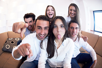 Image showing group of friends taking selfie