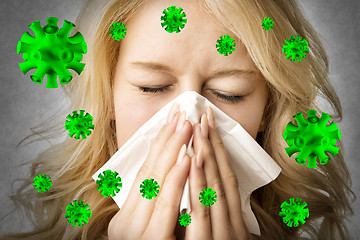 Image showing Ill woman with tissue is sneezing virus