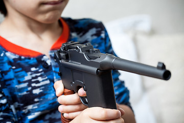 Image showing boy with submachine gun Mauser