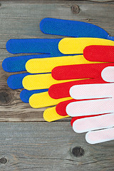 Image showing construction gloves on an old workbench