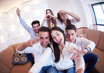 Image showing group of friends taking selfie