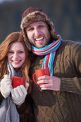 Image showing couple drink warm tea at winter