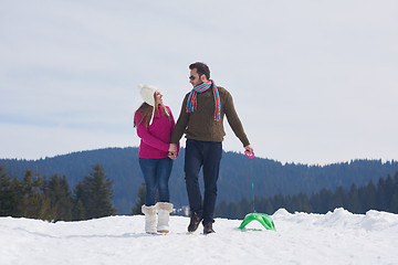 Image showing happy young couple having fun on fresh show on winter vacation