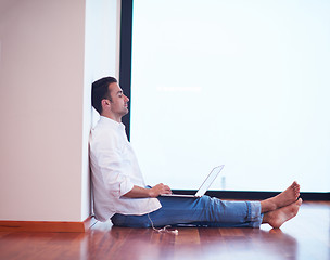 Image showing working on laptop computer from home