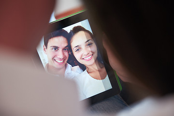 Image showing couple at modern home using tablet computer