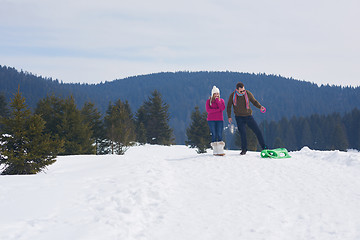 Image showing happy young couple having fun on fresh show on winter vacation