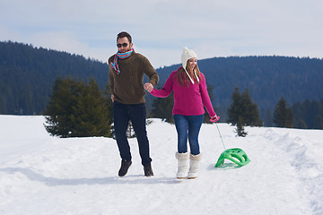 Image showing happy young couple having fun on fresh show on winter vacation