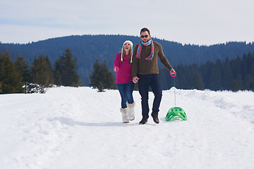 Image showing happy young couple having fun on fresh show on winter vacation