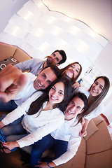 Image showing group of friends taking selfie