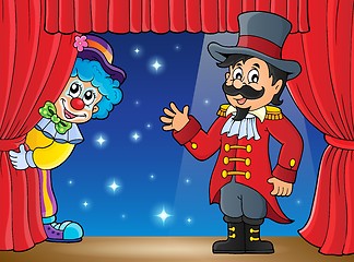 Image showing Stage with ringmaster and lurking clown