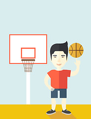 Image showing Basketball player spinning ball.