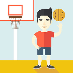 Image showing Basketball player spinning ball.