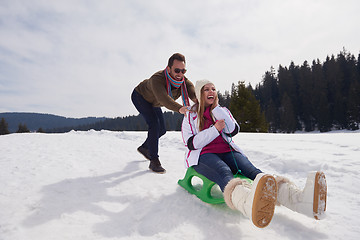 Image showing happy young couple having fun on fresh show on winter vacation