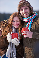 Image showing couple drink warm tea at winter