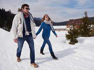 Image showing happy young couple having fun on fresh show on winter vacation