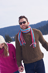 Image showing happy young couple having fun on fresh show on winter vacation