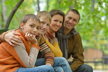 Image showing Family of four sitting