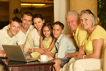 Image showing  family sitting with laptop