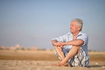 Image showing Senior man in desert