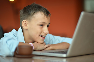 Image showing  boy with laptop 