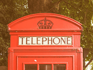 Image showing Retro looking Red phone box in London