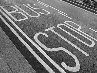 Image showing Black and white Bus stop sign
